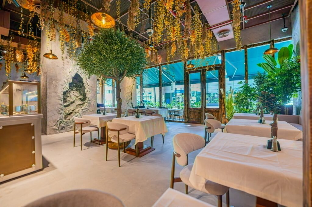 Lokanta 1928 interior with hanging greenery